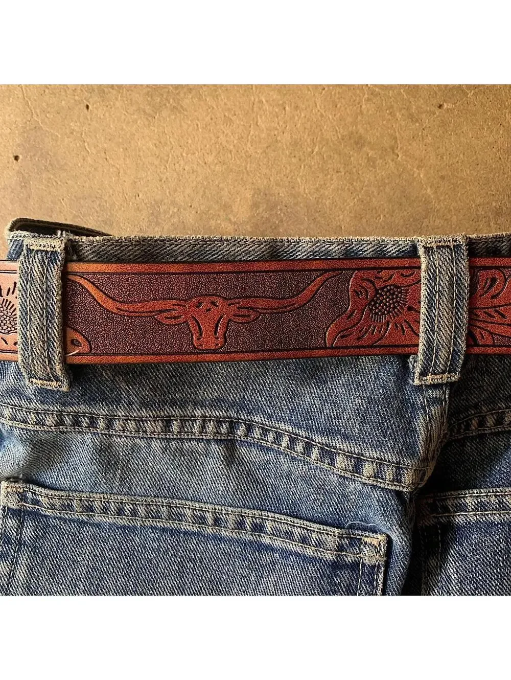 American Western Brown leather belt with silver-toned brass buckle, featuring a
